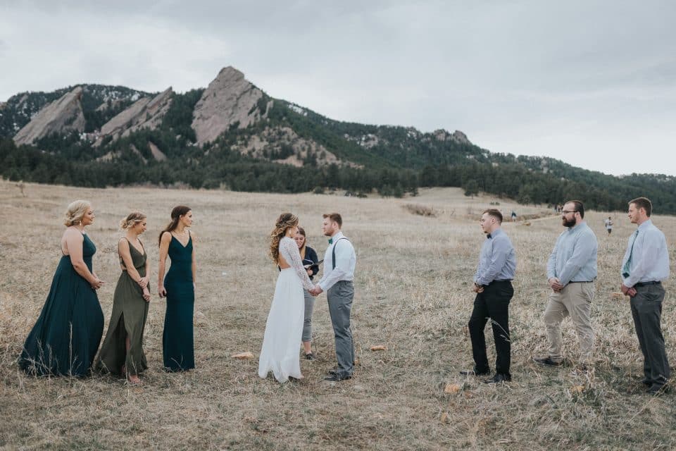 Couple's elopement ceremony takes place in a meadow in Colorado at their very own micro wedding.
